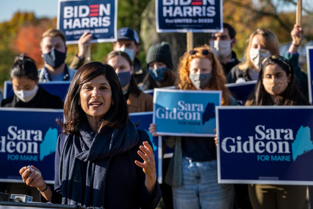 Democratic Senate candidate Sara Gideon talks to the press after she filled out her absentee ballot to vote in person at the town hall in Freeport, Maine, on Oct. 14, 2020. (Sarah Rice/Getty Images)