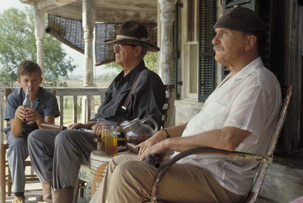 A film paying homage to the adventurous spirit: (L–R) Haley Joel Osment, Michael Caine, and Robert Duvall in “Secondhand Lions.” (New Line Cinema)