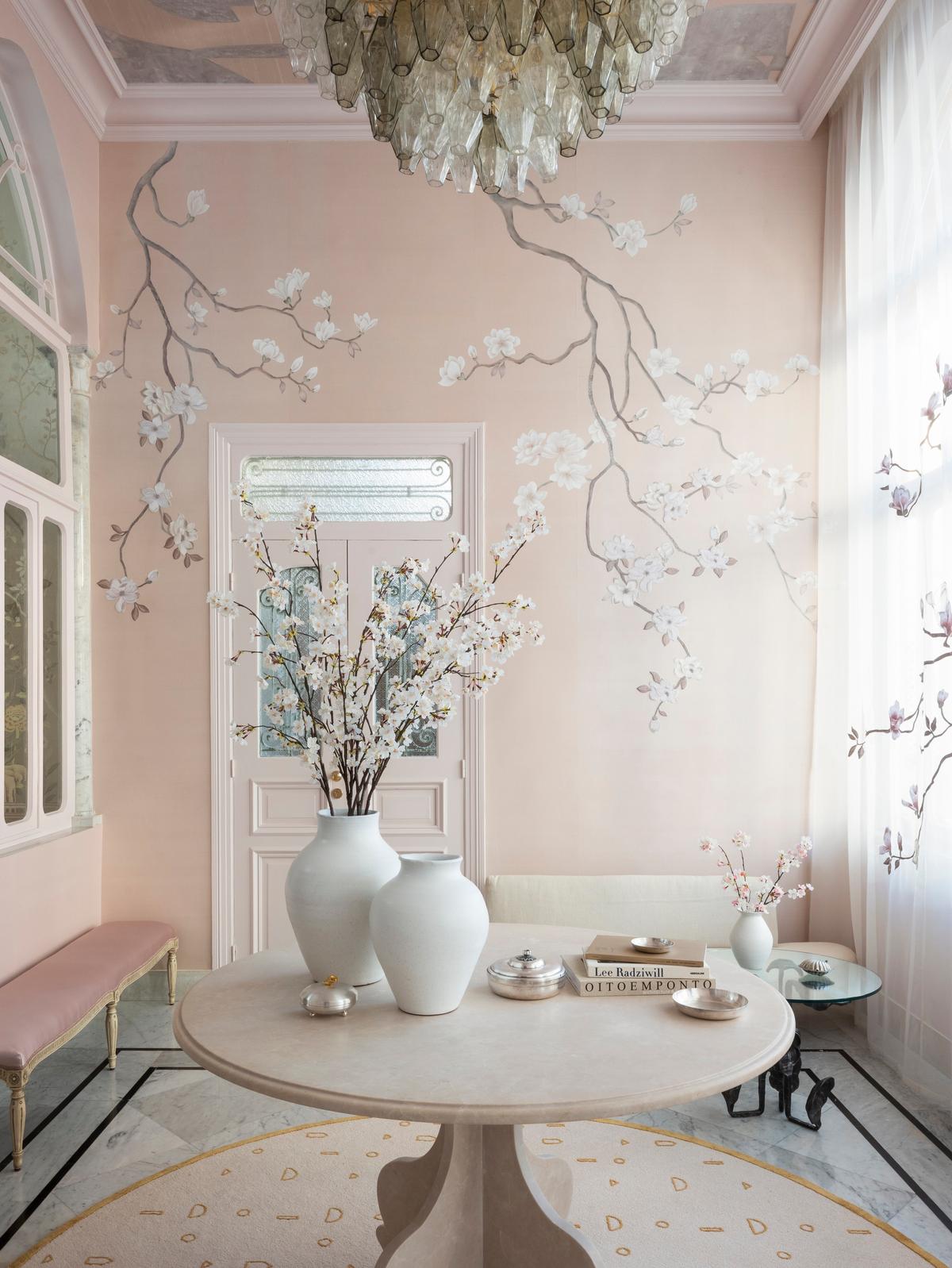 Delicate magnolia branches ("Magnolia Canopy") greet guests at de Gournay's showroom in Beirut, Lebanon. (Rebecca Reid)