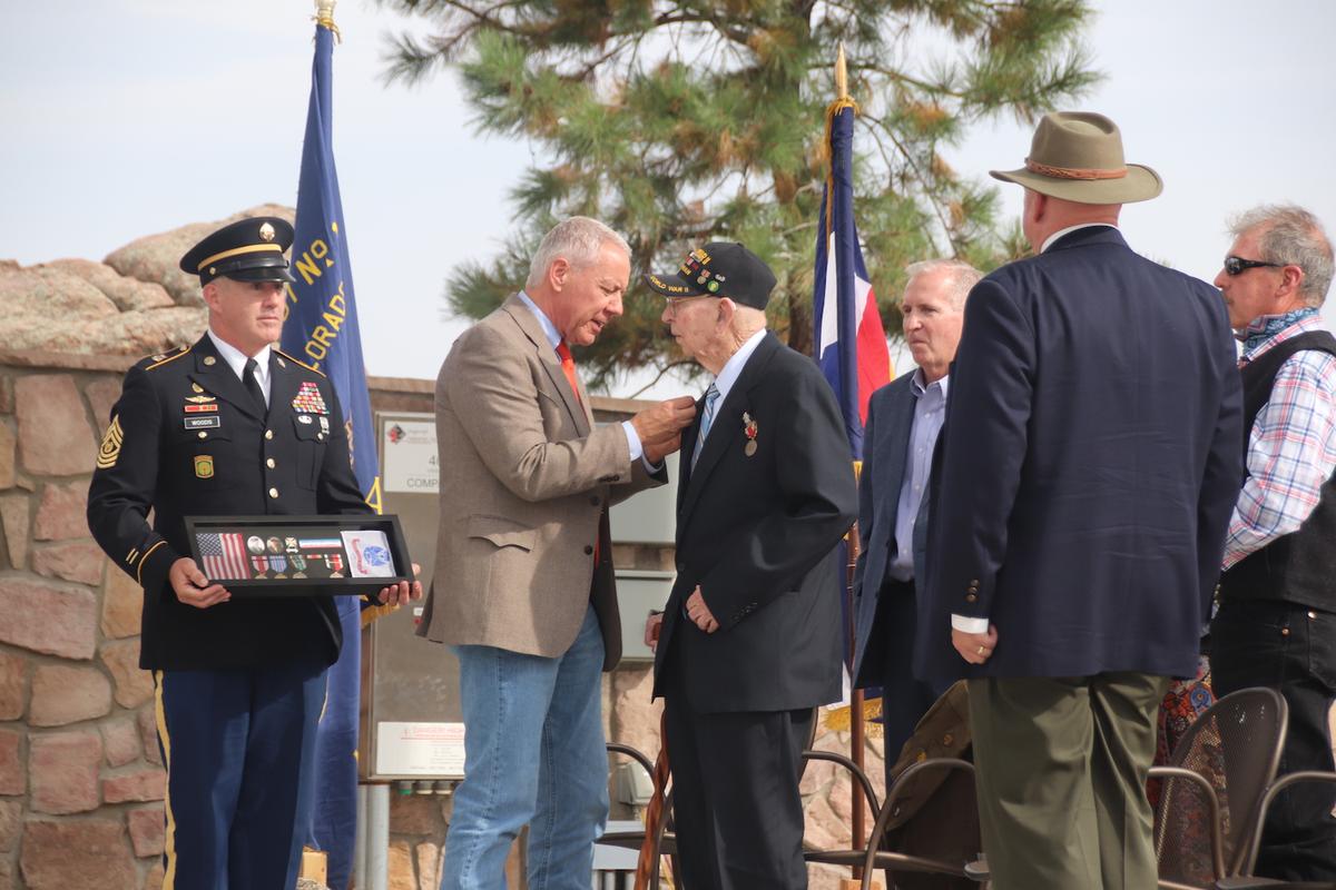 (L-R): Command Sergeant Major Bill Woods, Congressman Ken Buck, and Private First Class Arthur Brodin. (Courtesy of Lindsey Curnutte)