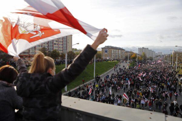 People attend an opposition rally to reject the presidential election results in Minsk, on Oct. 18, 2020. (Stringer/Reuters)