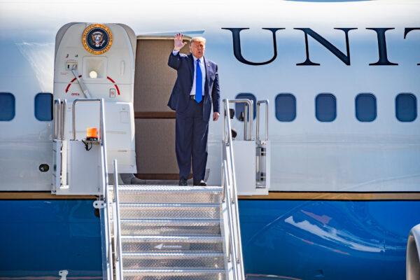 President Donald Trump greets cheering supporters at John Wayne Airport in Santa Ana, Calif., on Oct. 18, 2020. (John Fredricks/The Epoch Times)