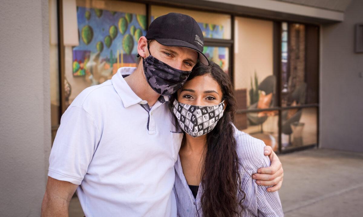 Jordyn Robinson (R) and her partner, Cody Hourihan, in downtown Phoenix on Oct. 16, 2020. (The Epoch Times)
