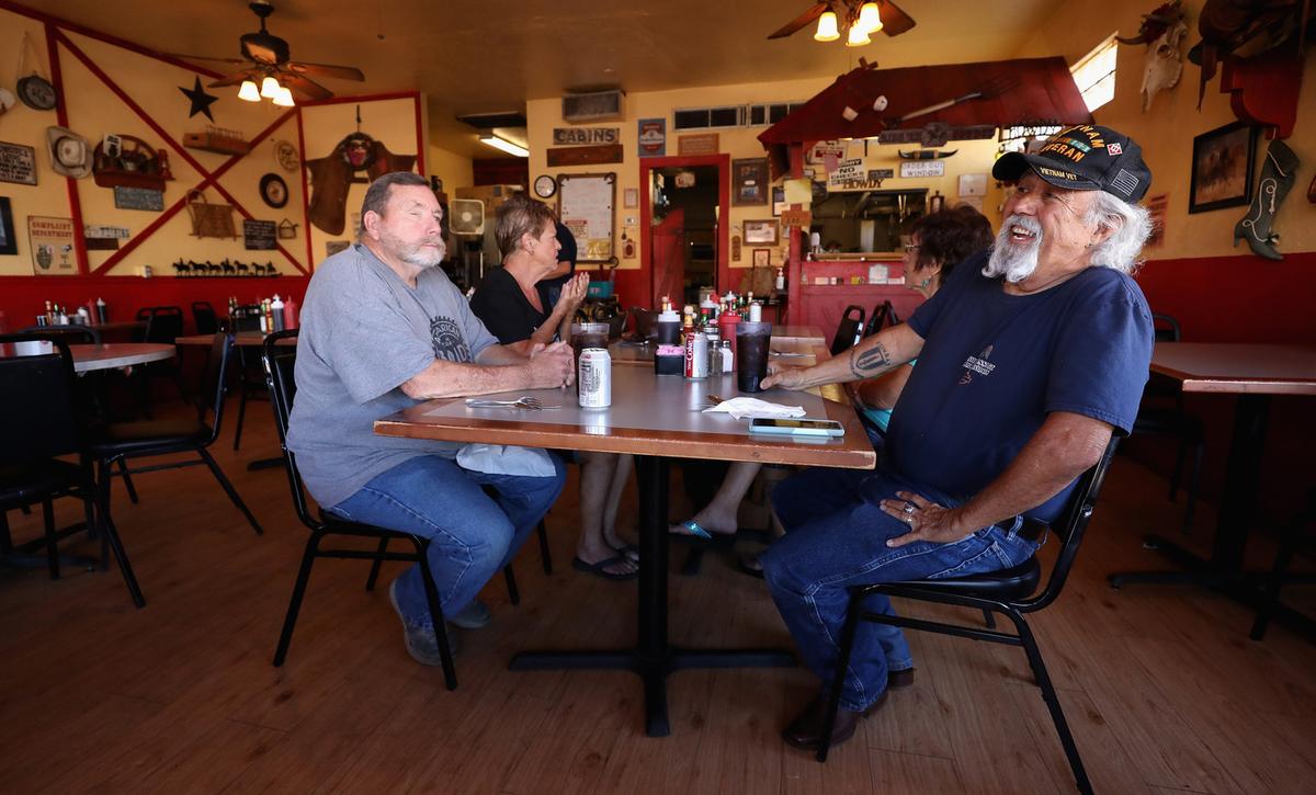 Customers await their food as they dine-in at the Horseshoe Cafe in Wickenburg, Arizona on May 1, 2020. (Christian Petersen/Getty Images)