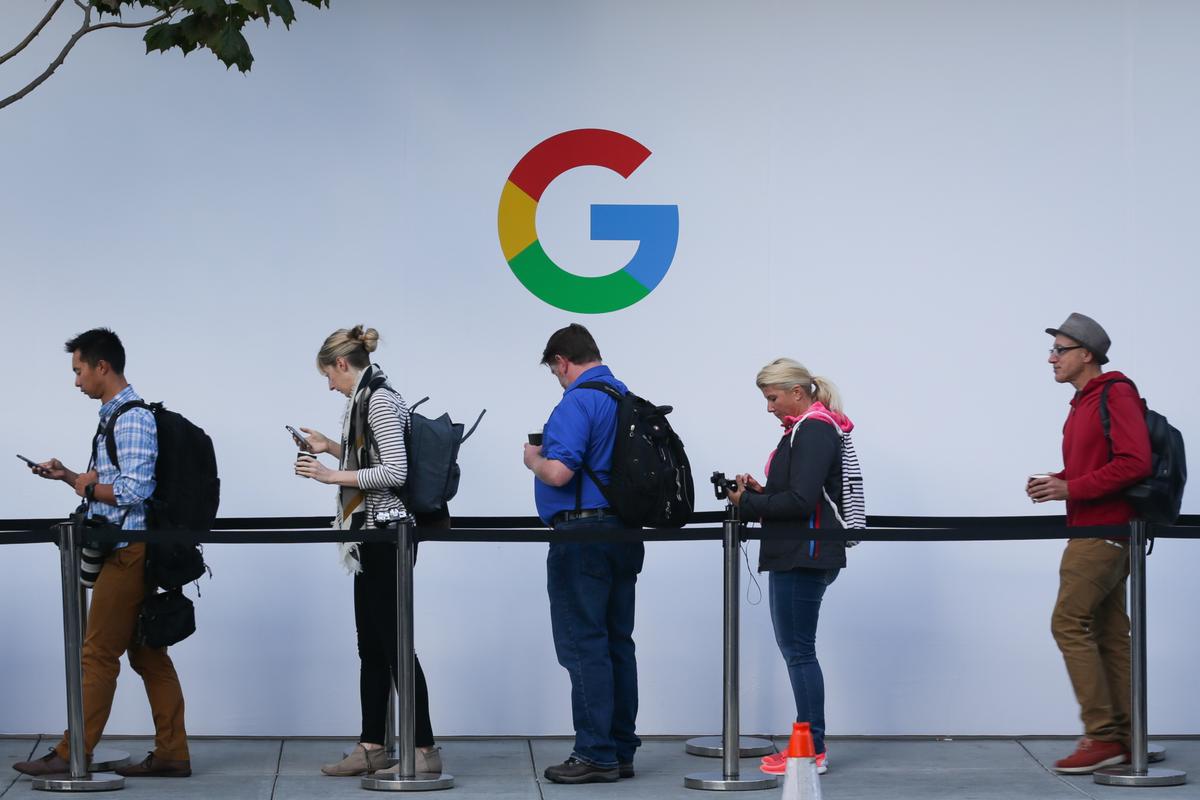 Attendees wait in line to enter a Google product launch event at the SFJAZZ Center in San Francisco on Oct. 4, 2017. (Elijah Nouvelake/AFP via Getty Images)