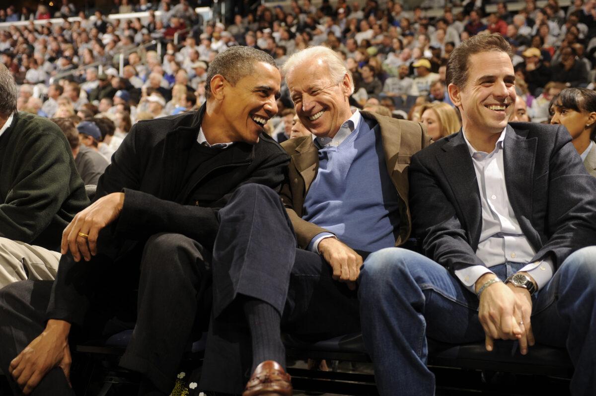 Hunter Biden with then-President Barack Obama and Vice President Joe Biden during a college basketball game at the Verizon Center in Washington on Jan. 30, 2010. (Mitchell Layton/Getty Images)