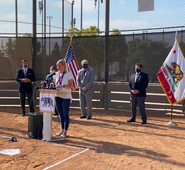 Olympic gold medalist Jessica Hardy Meichtry calls for the reopening of youth sports activities in Tustin, Calif., on Oct. 19, 2020. (Drew Van Voorhis/The Epoch Times)