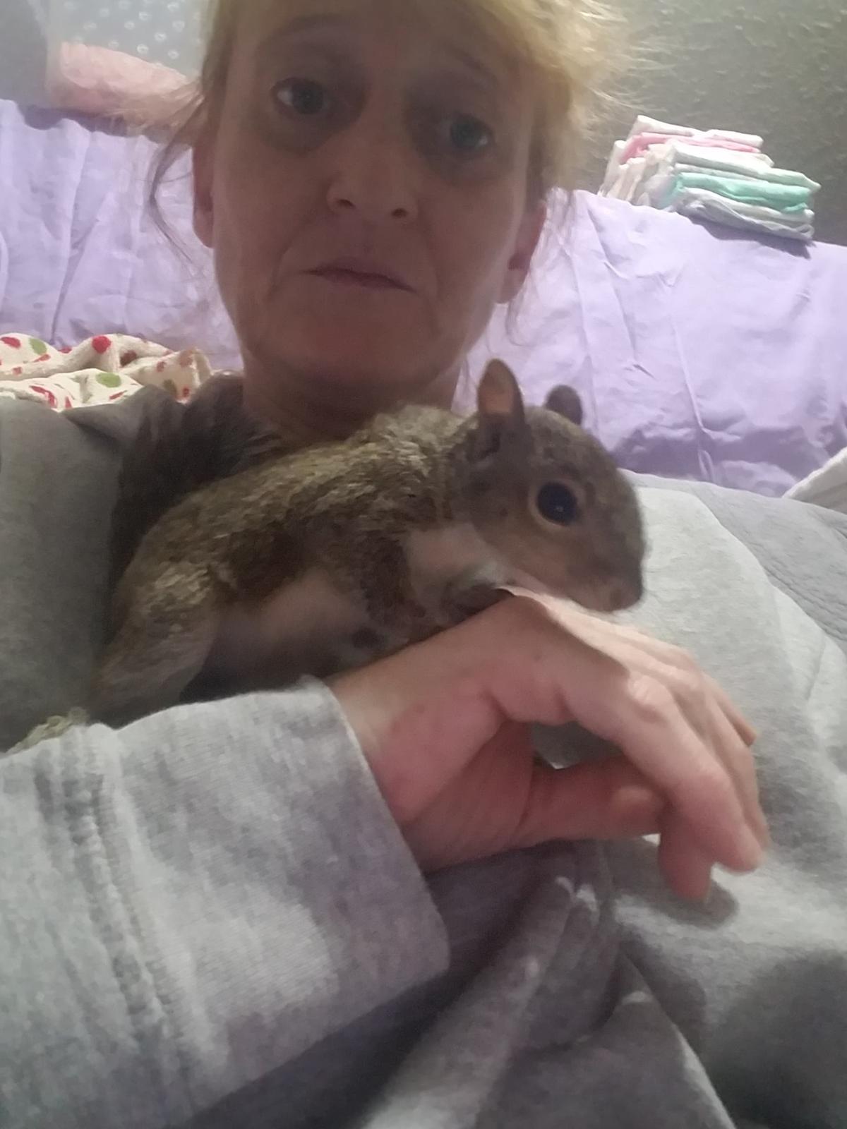 Laura Ross and the lucky squirrel. (Courtesy of <a href="https://www.facebook.com/Unikorngrrl/">Laura Ross</a>)