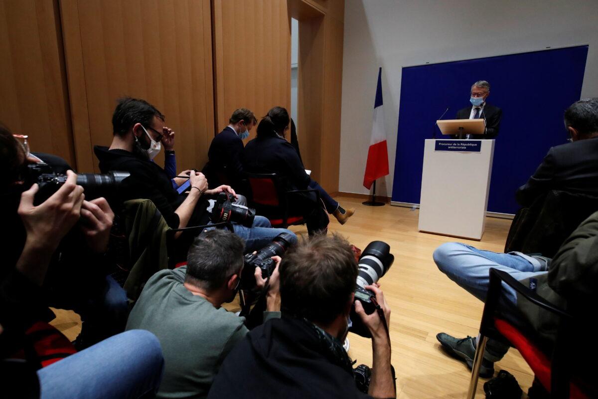 French anti-terrorism prosecutor Jean-Francois Ricard, wearing a protective face mask, speaks during a news conference on the latest in the investigation over the murder of the French teacher Samuel Paty, who was beheaded on the streets of the Paris suburb of Conflans-Sainte-Honorine, at the courthouse in Paris, France, Oct. 21, 2020. (Charles Platiau/Reuters)