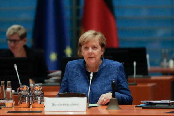 German Chancellor Angela Merkel attends the weekly cabinet meeting at the chancellery in Berlin, on Oct. 21, 2020. (Markus Schreiber/AP Photo)