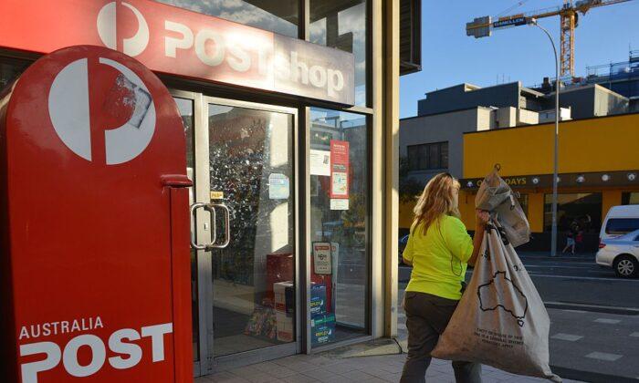 Australia Post Boss Steps Aside Over Watches