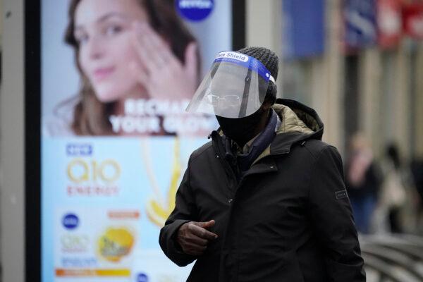 A man is seen wearing a face mask amid the COVID-19 virus pandemic in Sheffield, England, on Oct. 22, 2020. (Christopher Furlong/Getty Images)