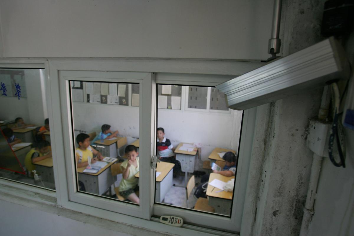 A camera records the activities in a classroom at the West Point Training Center in Hangzhou, Zhejiang Province of China, on Aug. 1, 2006. (Cancan Chu/Getty Images)
