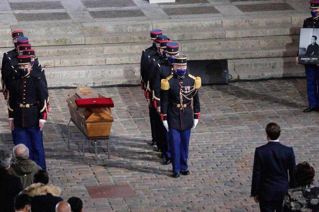 Beheaded Teacher Was ‘Quiet Hero’ Who Incarnated French Values, Macron Says