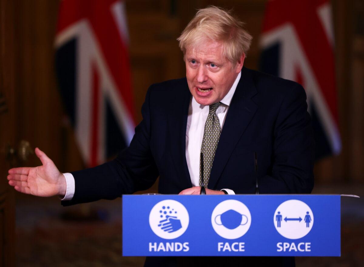 British Prime Minister Boris Johnson addresses the nation during a news conference on the CCP virus at 10 Downing Street, London, on Oct. 22, 2020 (Henry Nicholls/Pool/Getty Images)