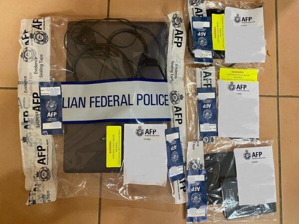 Seized electronic devices from Eagle Vale, Australia. (AFP)