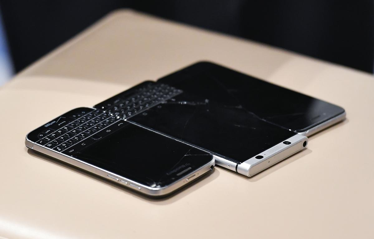 Three mobile phones belonging to Tony Bobulinski, who claims to have been an associate of Hunter Biden, as he speaks to reporters at a hotel in Nashville, Tenn., on Oct. 22, 2020. (Mandel Ngan/AFP via Getty Images)