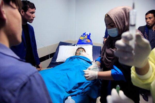 An Afghan receives treatment at the hospital after a suicide attack in Kabul, Afghanistan, Saturday, Oct. 24, 2020. (Mariam Zuhaib/AP Photo)