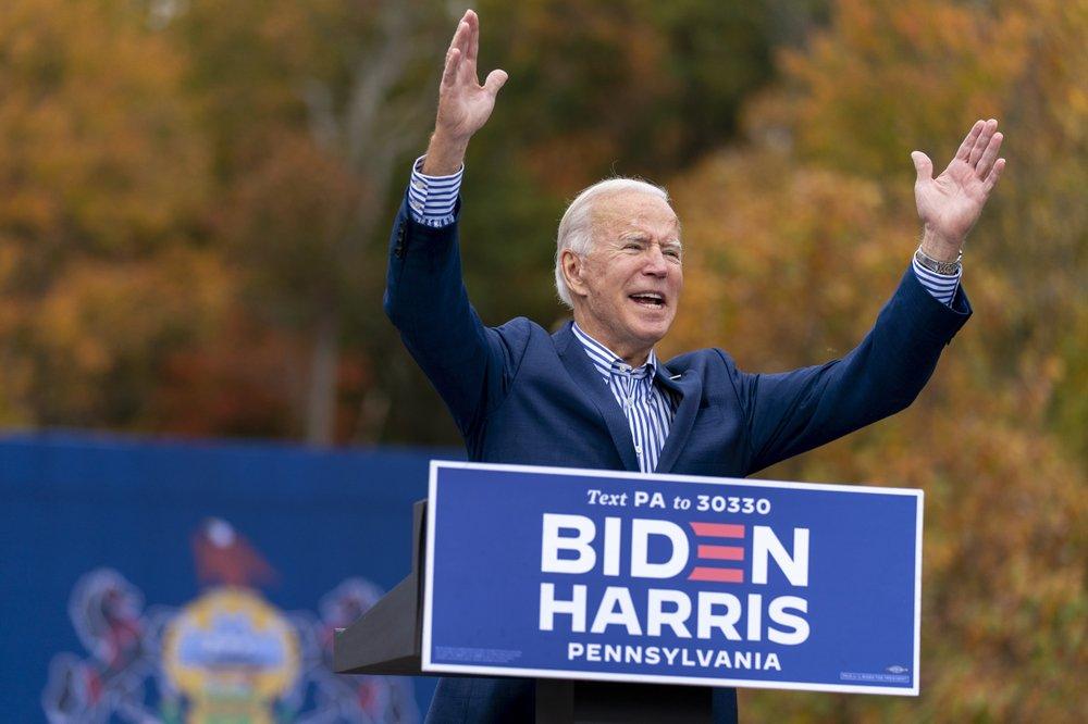  Democratic presidential candidate former Vice President Joe Biden speaks at a drive-in campaign stop at Bucks County Community College in Bristol, Pa., on Oct. 24, 2020. (AP Photo/Andrew Harnik)