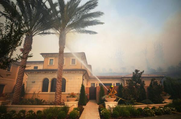 A firefighter works during the Silverado Fire in Irvine, Calif., on Oct. 26, 2020. (Mario Tama/Getty Images)