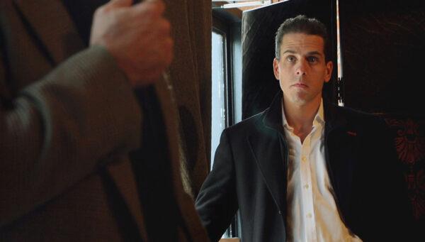 Hunter Biden looks on as then-Democratic vice presidential hopeful Sen. Joe Biden (D-Del.) fields questions in Dubuque, Iowa, on Dec. 9, 2007. (Scott Olson/Getty Images)