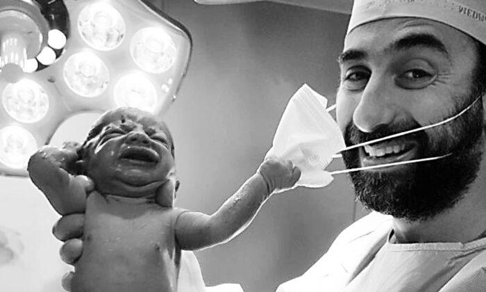 Newborn Snatches Doctor’s Mask, Photo Sends Message of Hope Amid COVID-19