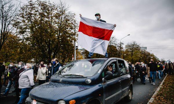 People attend an opposition rally to reject the Belarusian presidential election results in Minsk, on Oct. 25, 2020. (BelaPAN via Reuters)