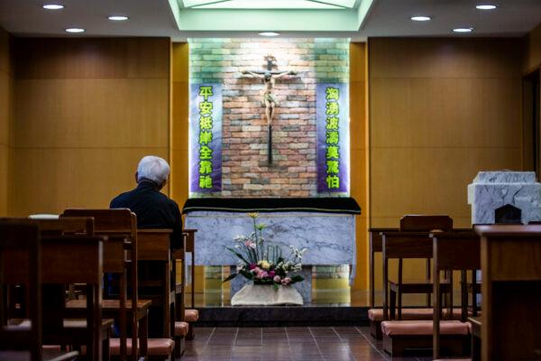 In this picture taken on Sept. 11, 2020, Cardinal Joseph Zen, former bishop of Hong Kong, prays in the chapel at his residence in Hong Kong.  (Isaac Lawrence/AFP via Getty Images)