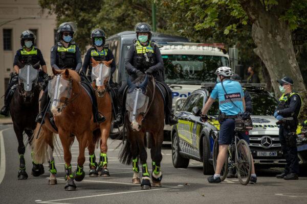 Victoria Police are seen in large numbers during a protest at the Shrine of Remembrance in Melbourne, Australia, on Sept. 23, 2020. (Darrian Traynor/Getty Images)
