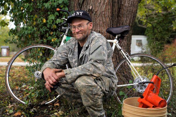 Paul pauses from doing yardwork for a neighbor, in Seelyville, Ind., on Oct. 20, 2020. (Cara Ding/The Epoch Times)