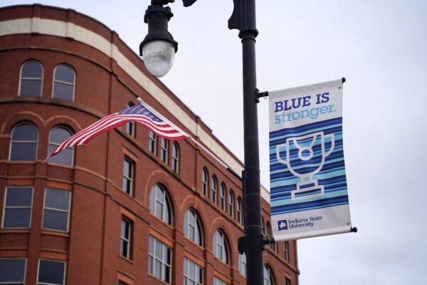 An Indiana State University banner hangs from a light pole on Wabash Avenue in downtown Terre Haute, Ind., on Oct. 20, 2020. (Cara Ding/The Epoch Times)