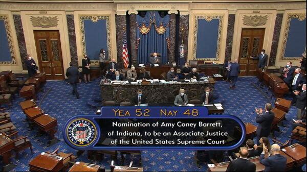 In this image from video, the vote total in the U.S. Senate on the confirmation of Amy Coney Barrett to become a Supreme Court justice at the U.S. Capitol in Washington, Oct. 26, 2020. (Senate Television via AP)
