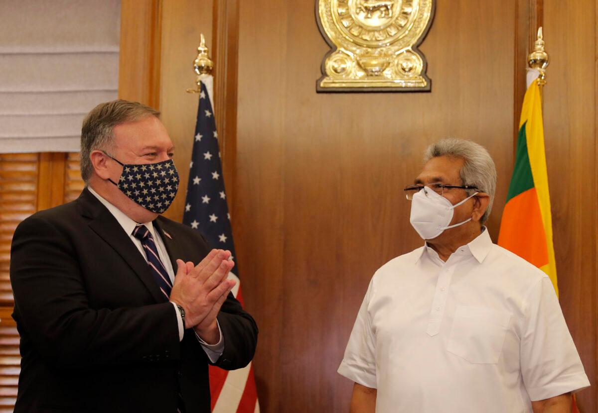 U.S. Secretary of State Mike Pompeo greets Sri Lankan President Gotabaya Rajapksa before their meeting in Colombo, Sri Lanka, Wednesday, Oct. 28, 2020. (Eranga Jayawardena, Pool/AP Photo)