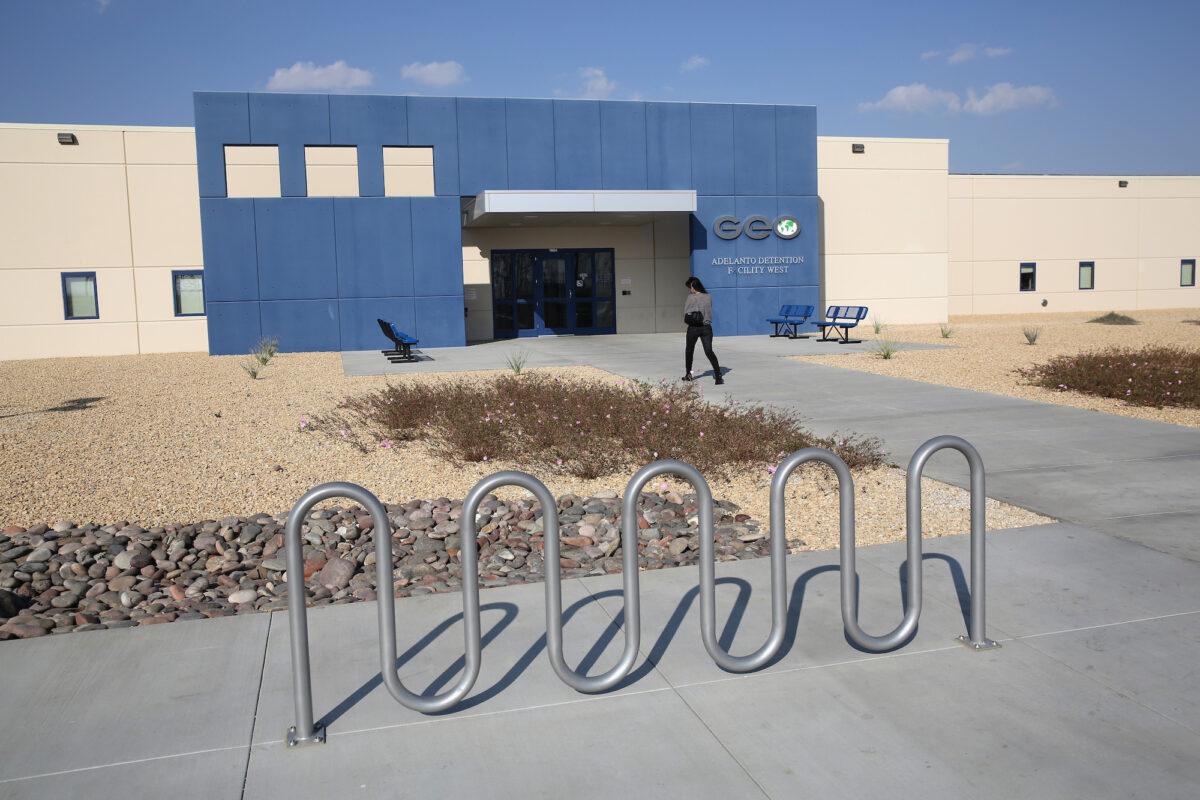 A family member walks into the Adelanto Detention Facility, in Adelanto, Calif., on Nov. 15, 2013. (John Moore/Getty Images)