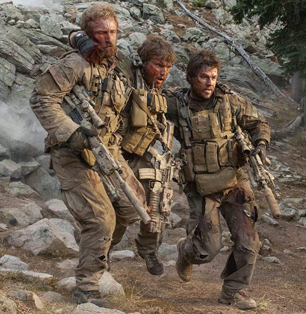 (L–R) Ben Foster, Emile Hirsch, and Mark Wahlberg in “Lone Survivor.” (Gregory E. Peters/Universal Pictures)