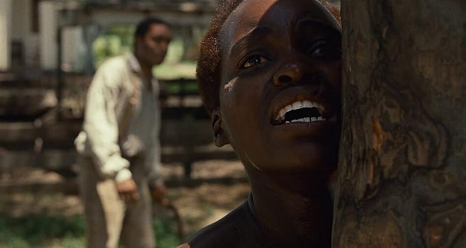 Solomon Northrup (Chiwetel Ejiofor, L) and Patsey (Lupita Nyong'o) in "12 Years a Slave." (Twentieth Century Fox)