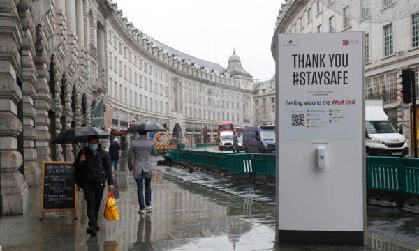 A large sign to thank people for coming to London's West End and to stay safe by observing social distancing to help stop the spread of the CCP virus in London, on Oct. 29, 2020. (Alastair Grant/AP Photo)