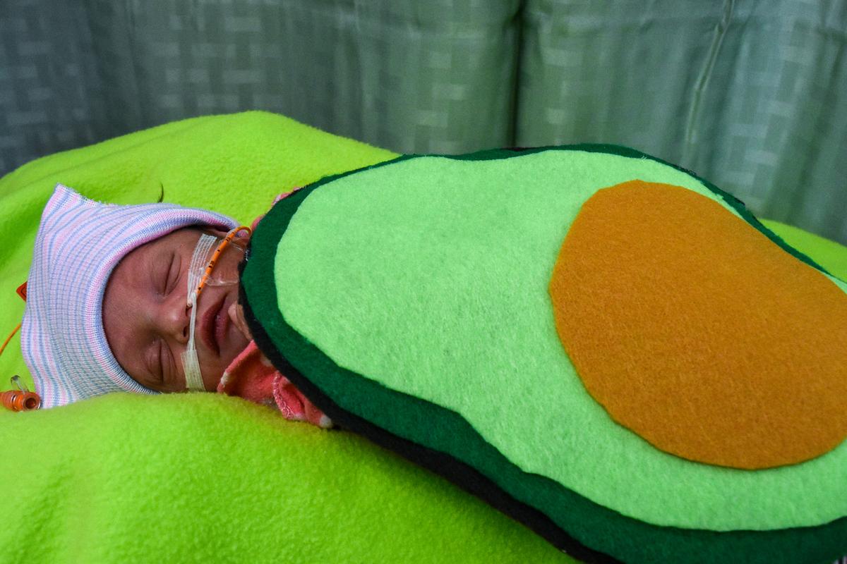 Baby from the Tallahassee Memorial HealthCare NICU dressed as guacamole. (Courtesy of <a href="https://www.facebook.com/TallahasseeMemorial">Tallahassee Memorial HealthCare</a>)