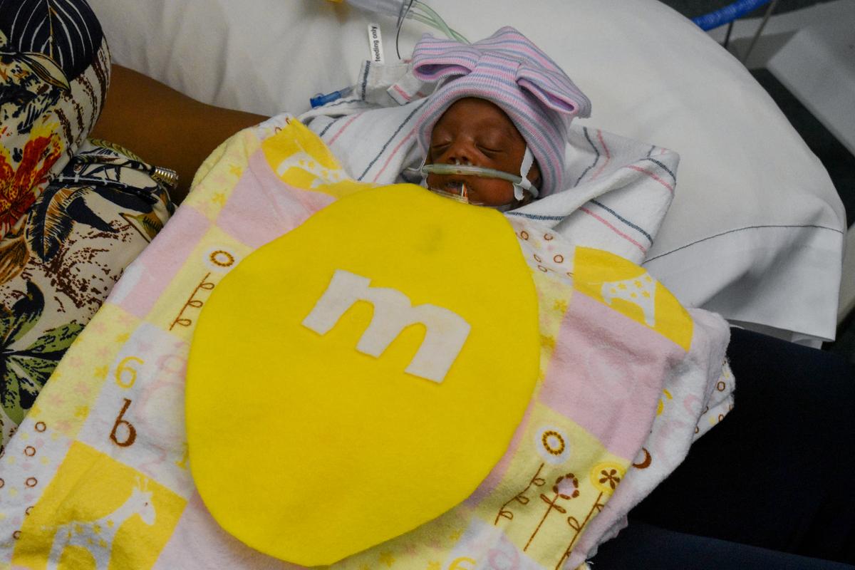 Baby from the Tallahassee Memorial HealthCare NICU dressed up in M&M candy costume. (Courtesy of <a href="https://www.facebook.com/TallahasseeMemorial">Tallahassee Memorial HealthCare</a>)