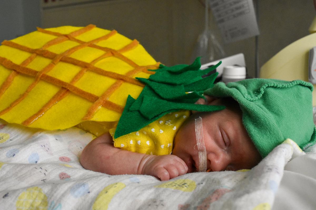 Baby from the Tallahassee Memorial HealthCare NICU dressed up in a pineapple costume. (Courtesy of <a href="https://www.facebook.com/TallahasseeMemorial">Tallahassee Memorial HealthCare</a>)