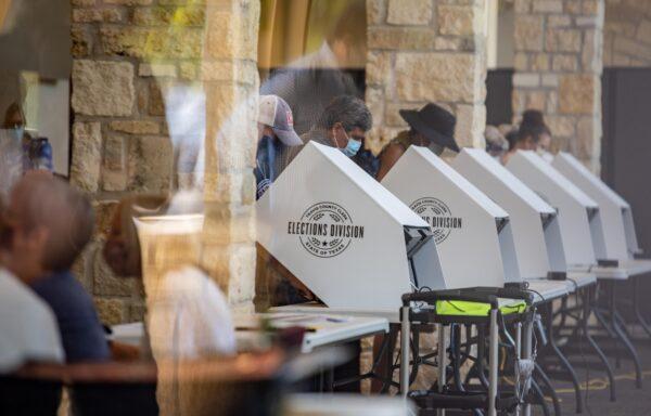 People cast their ballots at a polling location in Austin, Texas, on Oct. 13, 2020. (Sergio Flores/Getty Images)