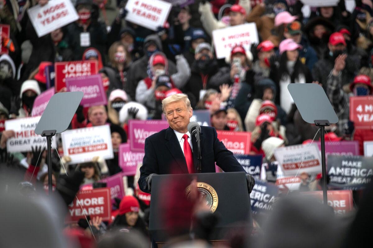President Donald Trump smiles at a campaign rally at Oakland County International Airport in Waterford, Mich., on Oct. 30, 2020. (John Moore/Getty Images)