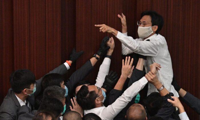 Seven Opposition Politicians Arrested in Hong Kong Over Legislative Scuffle