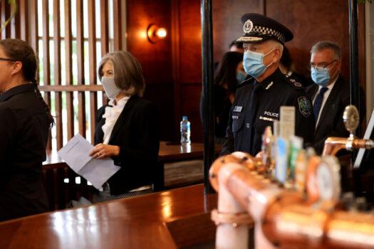 South Australian Chief Public Health Officer Nicola Spurrier and South Australian Police Commissioner Grant Stevens look on during the daily COVID-19 press conference at the Stag Hotel on December 01, 2020 in Adelaide, Australia. (Kelly Barnes/Getty Images)