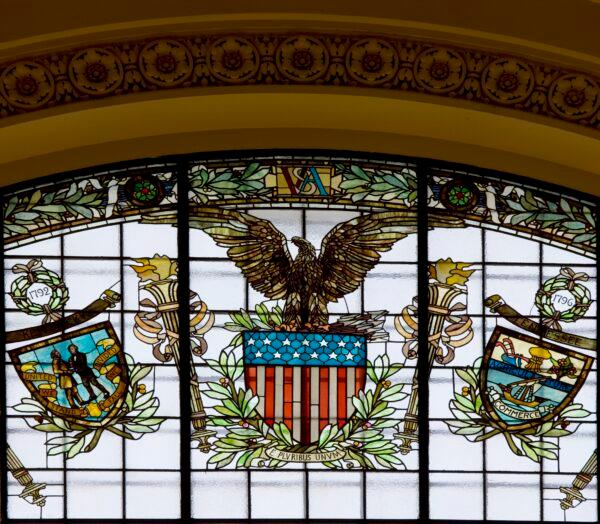 Stained glass window in an alcove of the reading rooms at the Thomas Jefferson Building. (Public Domain)