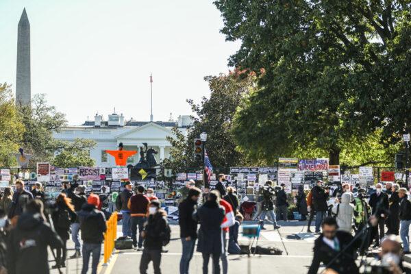 Members of the media start setting up for Election Day near the White House in Washington, on Nov. 2, 2020. (Charlotte Cuthbertson/The Epoch Times)