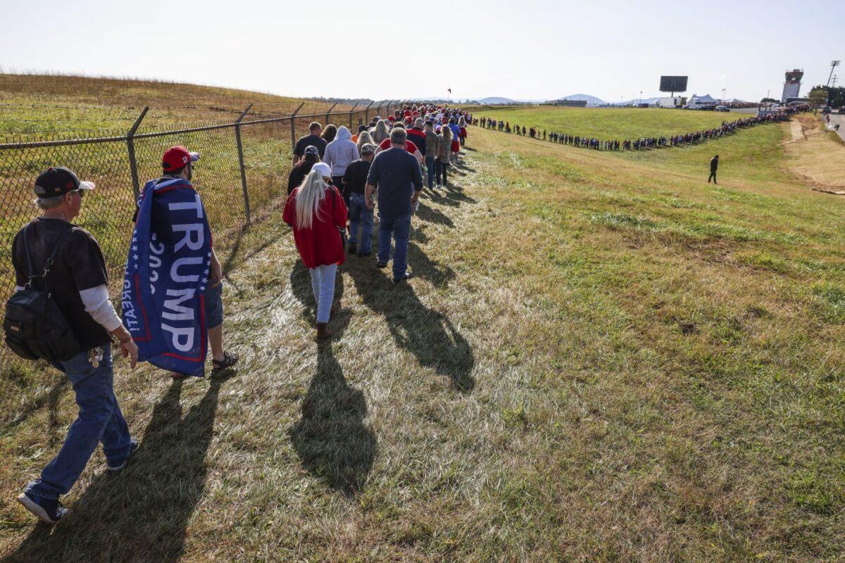 People wait in line to get into the Hickory Regional Airport to see President Donald Trump speak at a rally in Hickory, N.C. on Nov. 1, 2020. (Michael Ciaglo/Getty Images)
