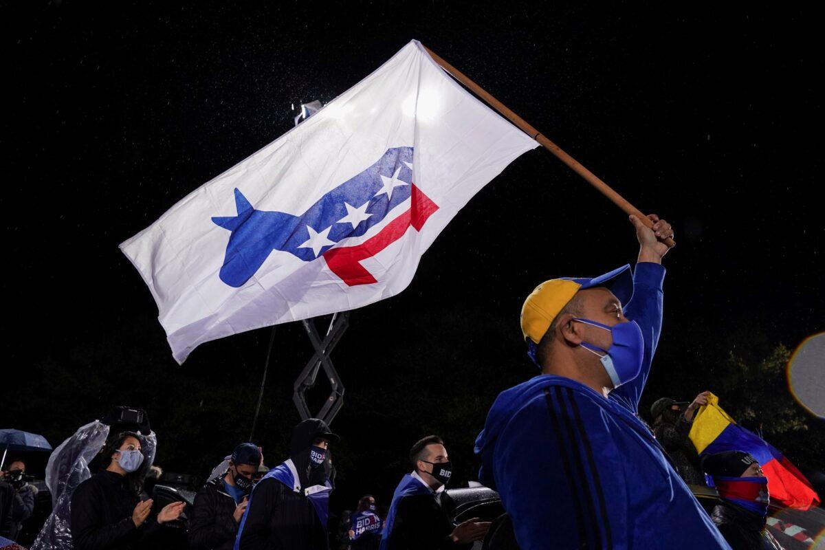 Supporters of Democratic presidential candidate Joe Biden and vice presidential nominee Kamala Harris take part in a drive-in campaign rally in Philadelphia, Penn., on Nov. 1, 2020. (Kevin Lamarque/Reuters)