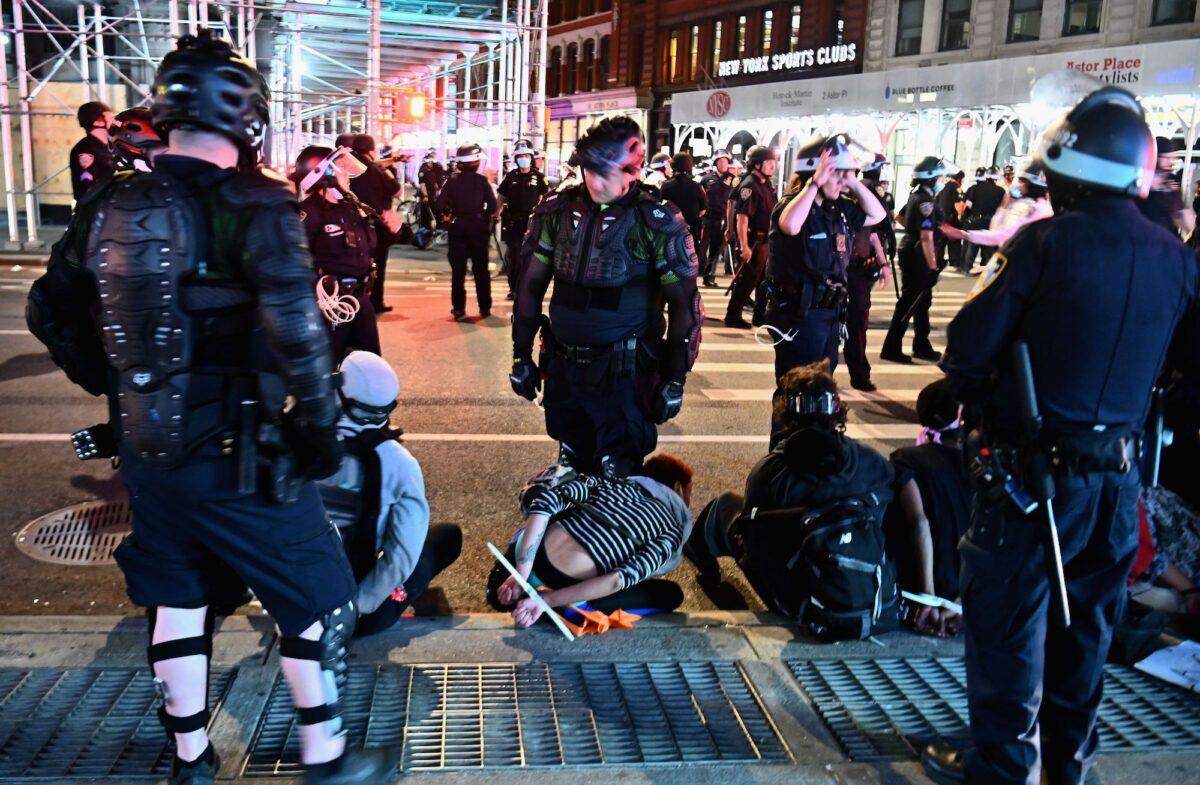People are arrested after looting in New York City, on June 2, 2020. (Angela Weiss/AFP via Getty Images)