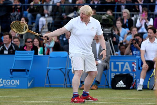 Then-London Mayor Boris Johnson in action during the Rally Against Cancer charity match on day seven of the AEGON Championships at Queens Club in London on June 16, 2013. (Clive Brunskill/Getty Images)